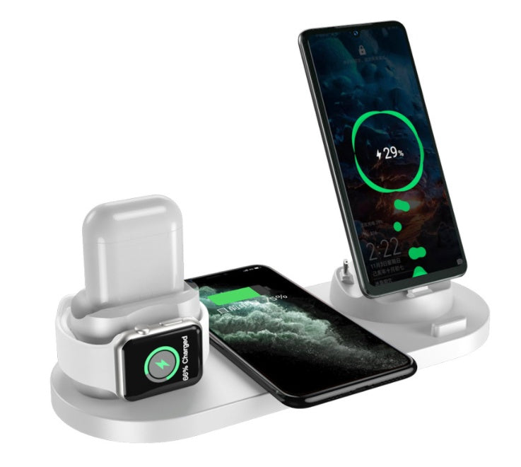 6-in-1 wireless charging dock charging an iPhone, iPad, and Apple Watch simultaneously on a compact desktop charging station in white (Color: White)