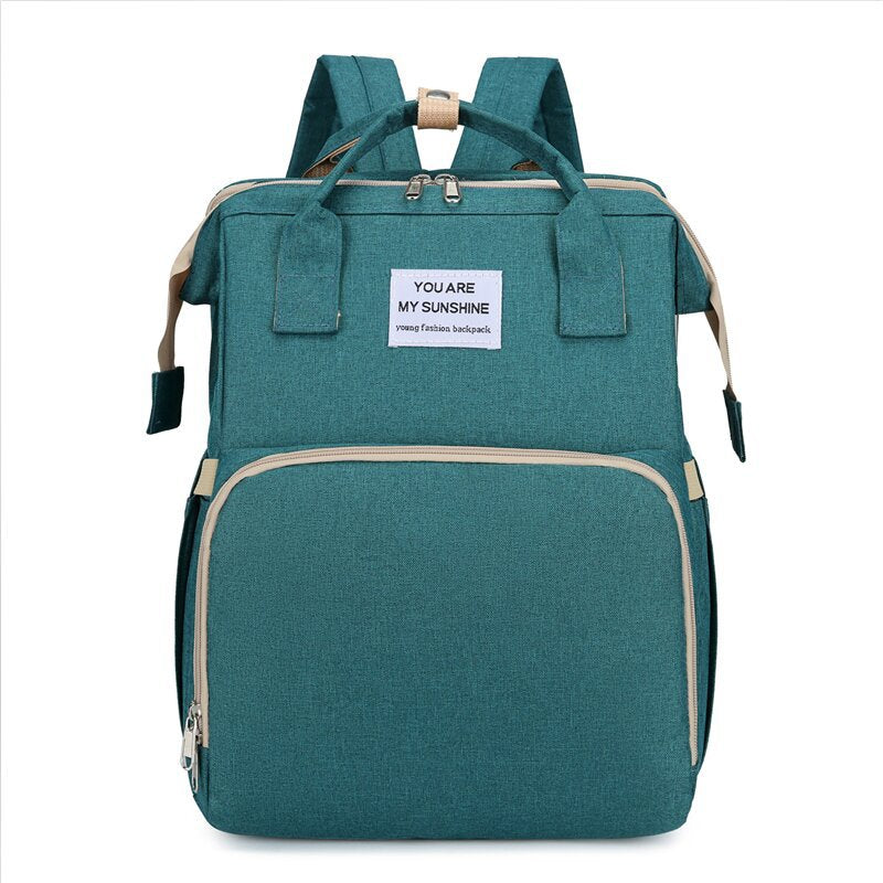 Baby diaper change backpack in green color with organized storage pockets cushioned straps and portable changing design (Color: Green)