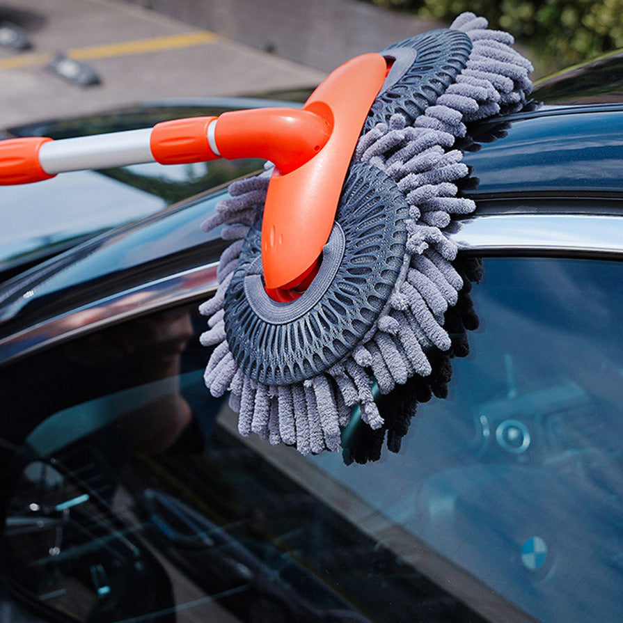 Car wash mop brush with extendable handle and chenille head for cleaning vehicles depiction of after use cleaned car