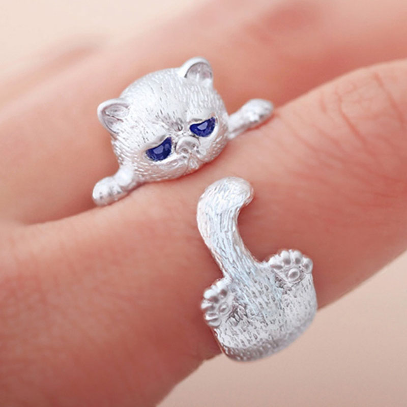 Cat style silver ring with adjustable fit and playful elegant cat inspired design model shot