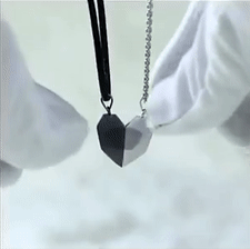 Magnetic couple necklace with matching pendants symbolizing connection love and friendship gif
