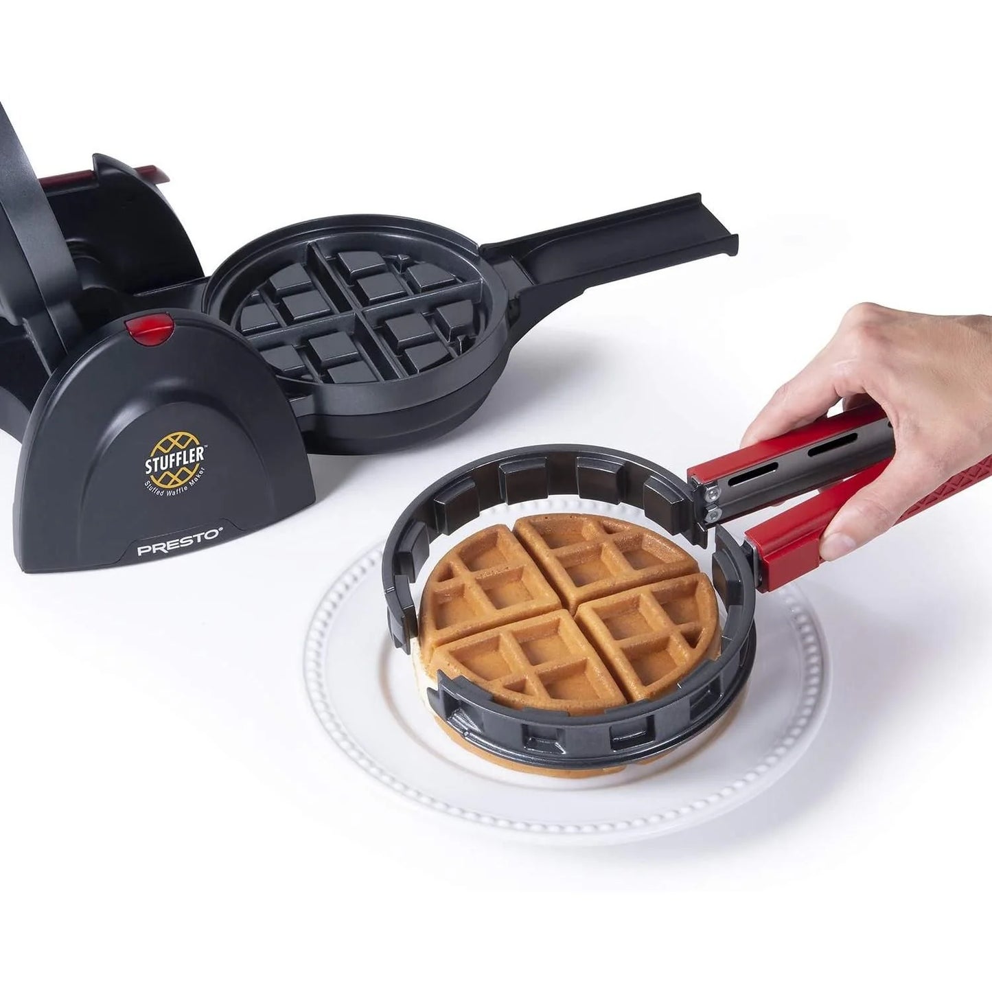 Stuffed waffle maker with rotating design nonstick plates and built in tongs for filled waffles depiction of easy moving of baked waffle