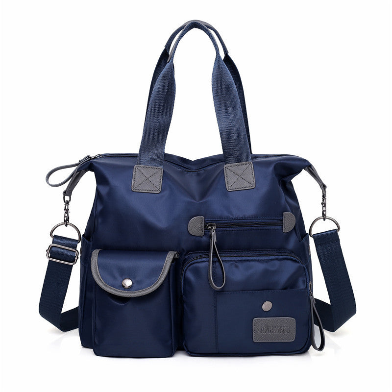 Women’s waterproof multi-pocket shoulder bag in blue color with large capacity for everyday commuting and casual use (Color: Blue)