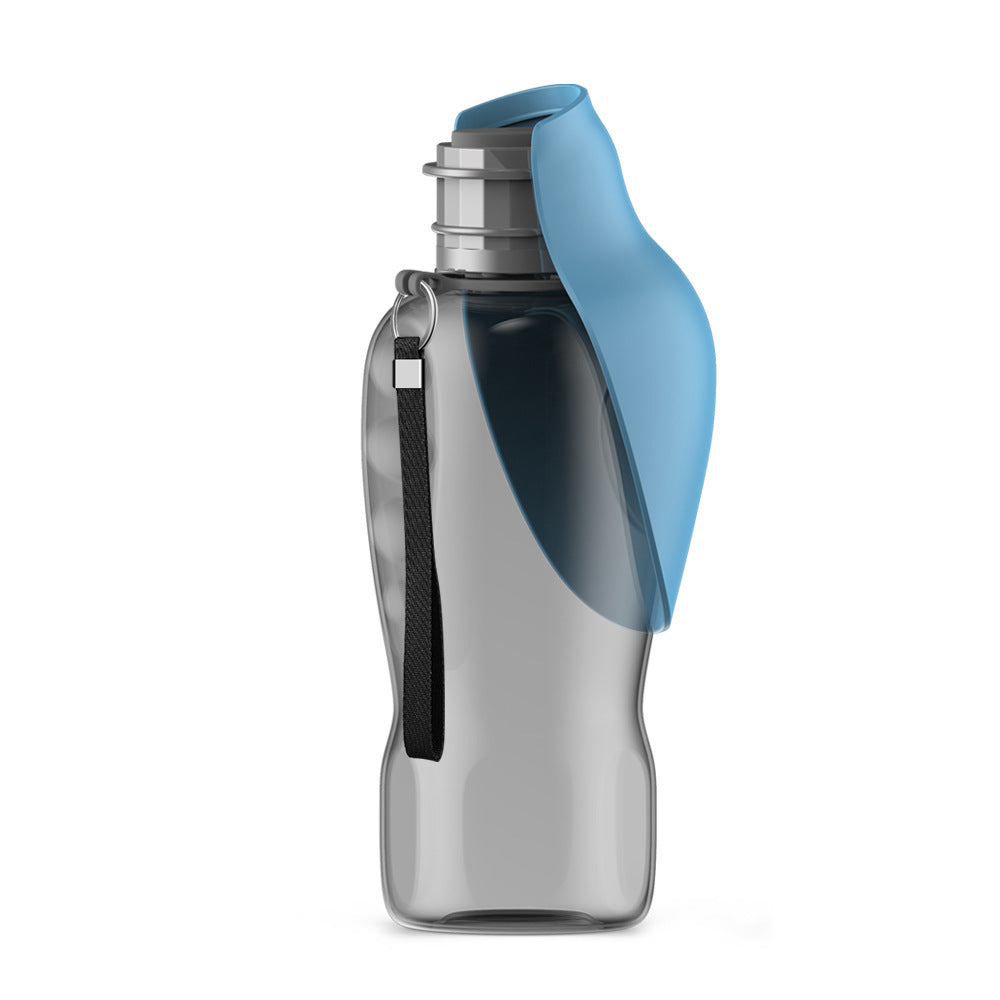 Portable dog water bottle in dark blue color with built-in bowl and one-button dispenser for outdoor hydration depiction of use (Color: Dark Blue)