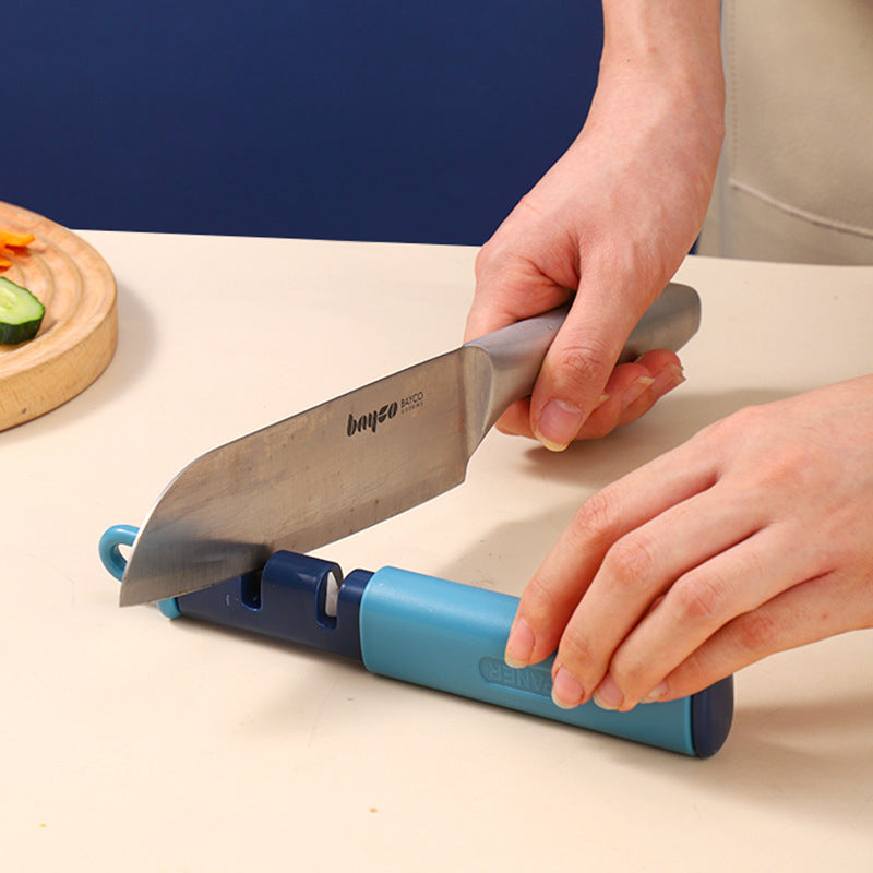 2 in 1 fruit peeler and knife sharpener stainless steel kitchen tool for peeling and sharpening depiction of knife sharpening