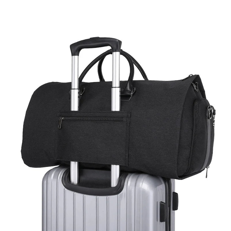 2 in 1 suit garment bag that converts to duffel with shoe compartment and waterproof material depiction of on luggage use