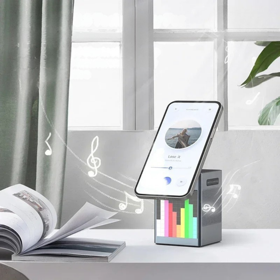 6 in 1 magnetic wireless charger with speaker alarm clock and LED light for desk or bedside depiction of bluetooth music play