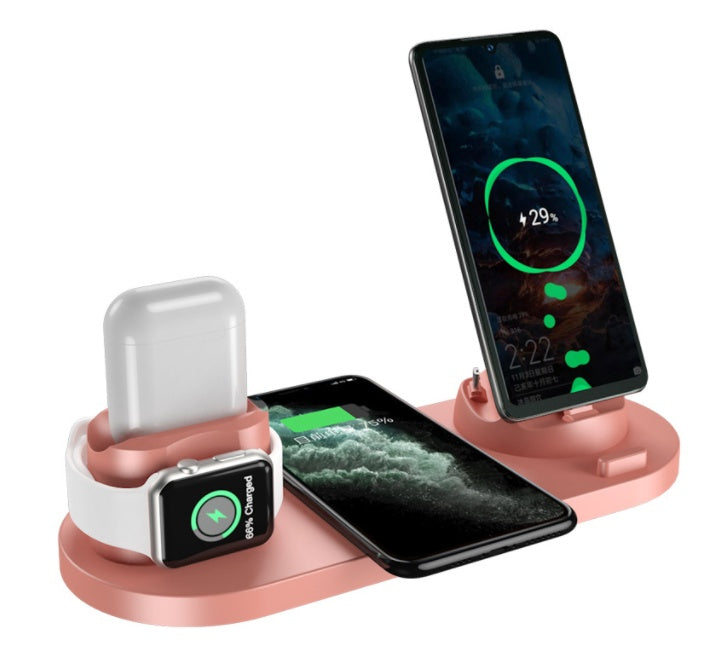 6-in-1 wireless charging dock charging an iPhone, iPad, and Apple Watch simultaneously on a compact desktop charging station in pink (Color: Pink)