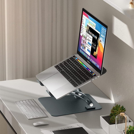 Adjustable aluminum laptop stand with ergonomic design and non slip silicone pads depiction of use on a desk