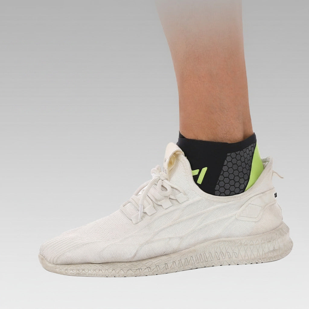 Ankle support and compression brace with lightweight flexible design for sports fitness and everyday comfort depiction of use with a shoe