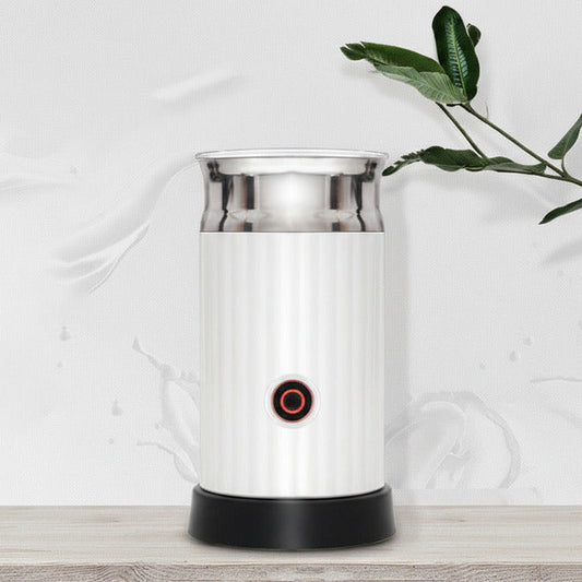 Automatic milk frother and heater on a kitchen counter