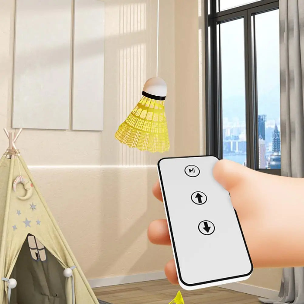 Badminton solo trainer with adjustable height for practicing swings and footwork at home depiction of remote control