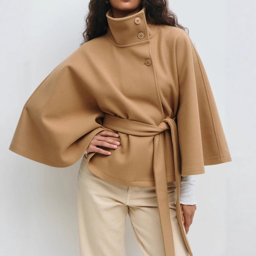 Batwing sleeve trench coat in khaki color with high neck loose fit and button front design model shot (Color: Khaki)