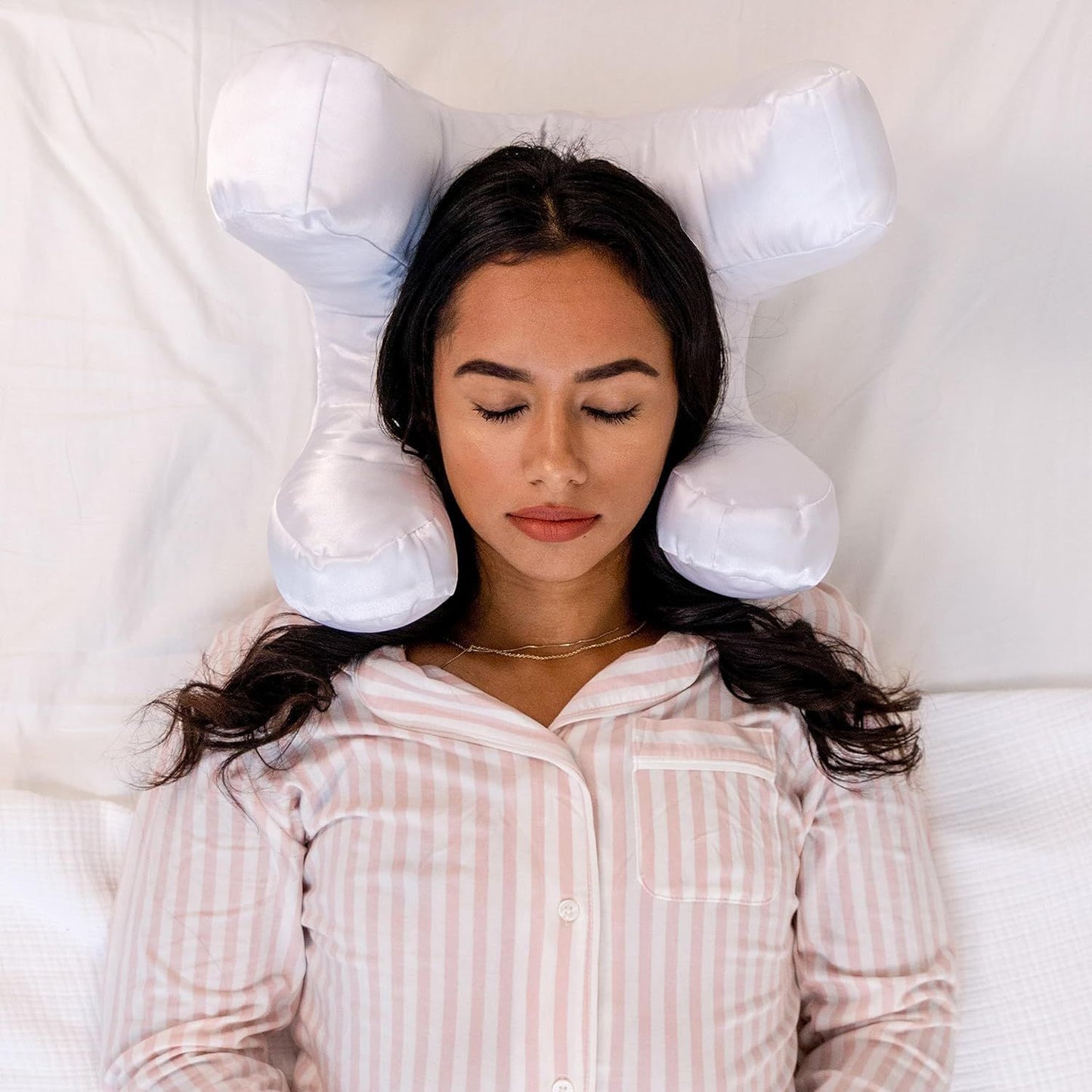 Beauty sleep pillow designed to help reduce facial pressure during sleep and support comfortable resting positions alternative model shot