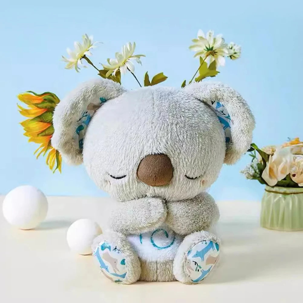Breathing koala plush toy with calming lights and soothing motion for relaxation and sleep product shot