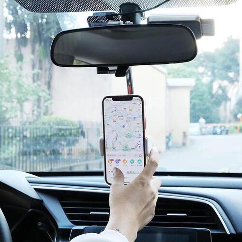 Car phone holder with 360 degree rotation adjustable viewing angles and secure rearview mounting design depiction of use