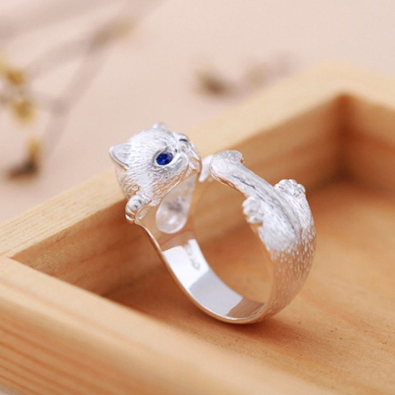 Cat style silver ring with adjustable fit and playful elegant cat inspired design product shot