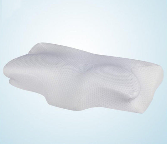 Cervical memory foam neck pillow designed to support the neck and promote proper sleeping posture close shot