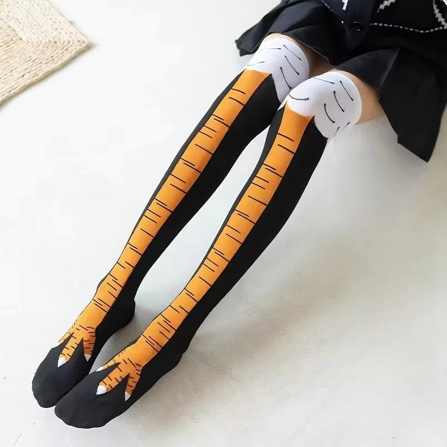 Novelty chicken feet knee-high socks with realistic feather print design for fun costumes or parties