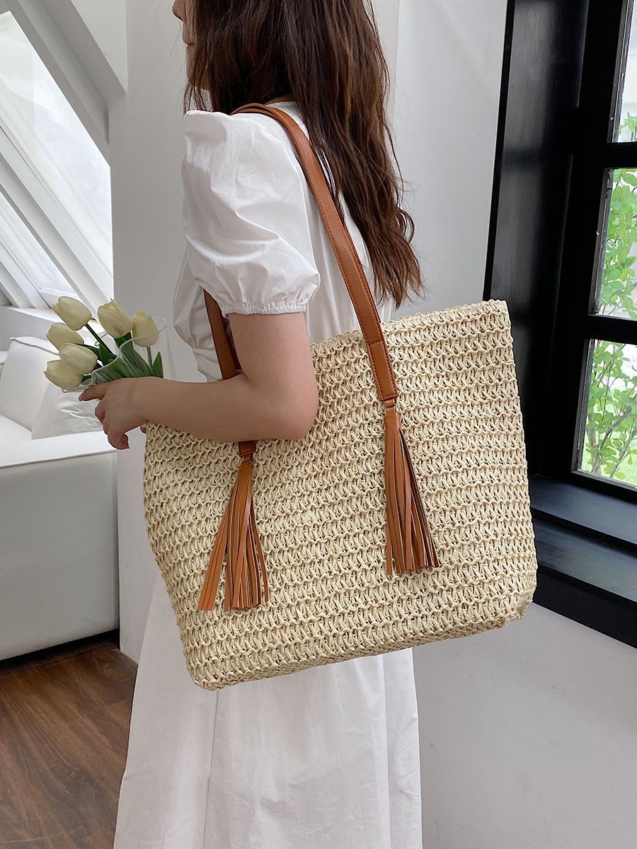 Cotton and linen shoulder bag in beige color with large capacity and soft casual design model shot