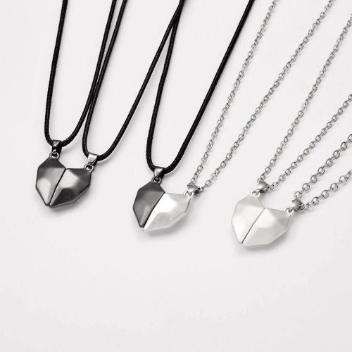 Magnetic couple necklace with matching pendants symbolizing connection love and friendship