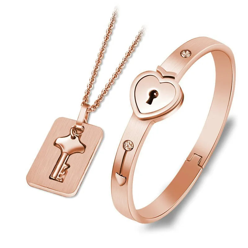 Couples lock and key bracelet set in rose color with matching necklace symbolizing love and connection (Color: Rose)
