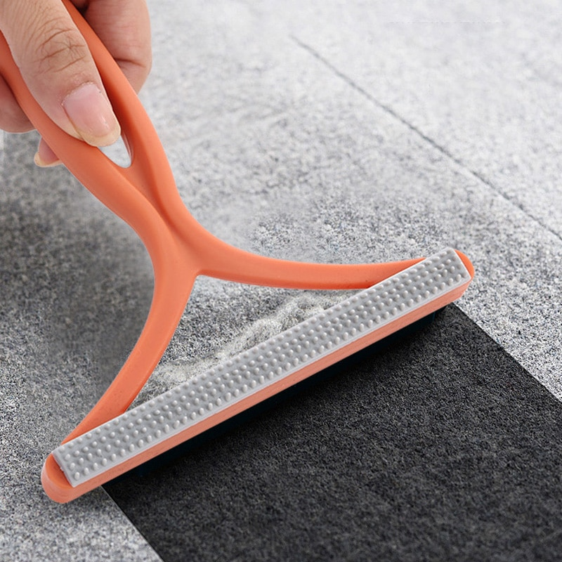 Double sided pet hair and lint remover tool for removing fur from clothes and furniture depiction of use