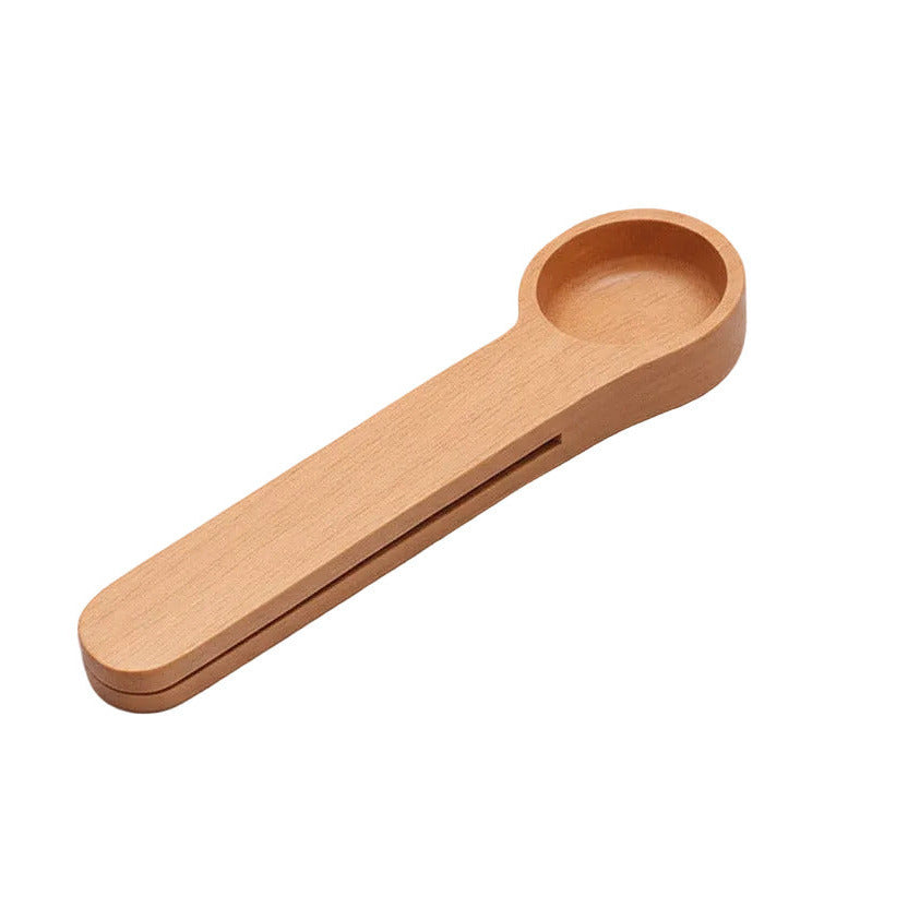Dual-purpose wooden measuring spoon and sealing clip in light color (Color: Light Alone)