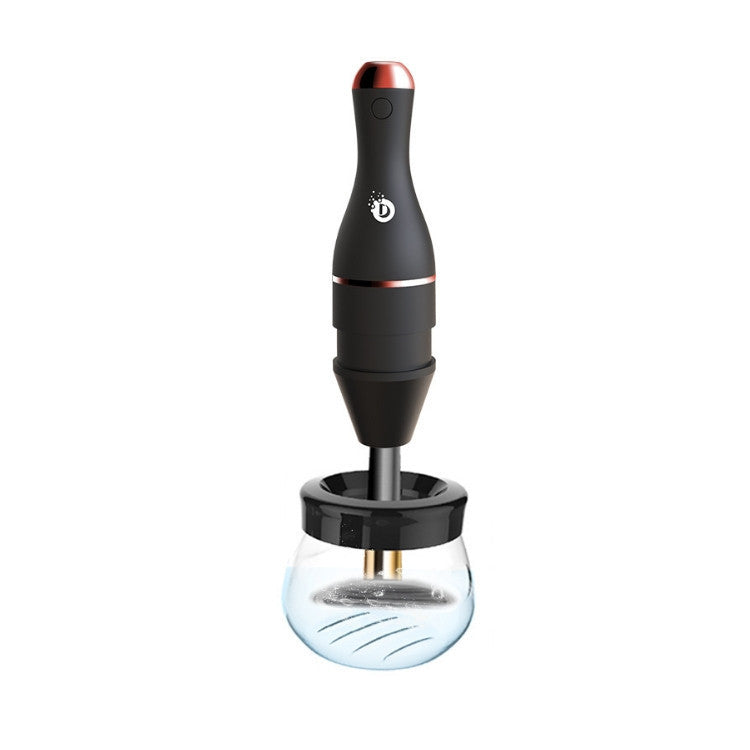 Electric makeup brush cleaner designed to quickly clean and dry makeup brushes using a compact, rechargeable design product shot