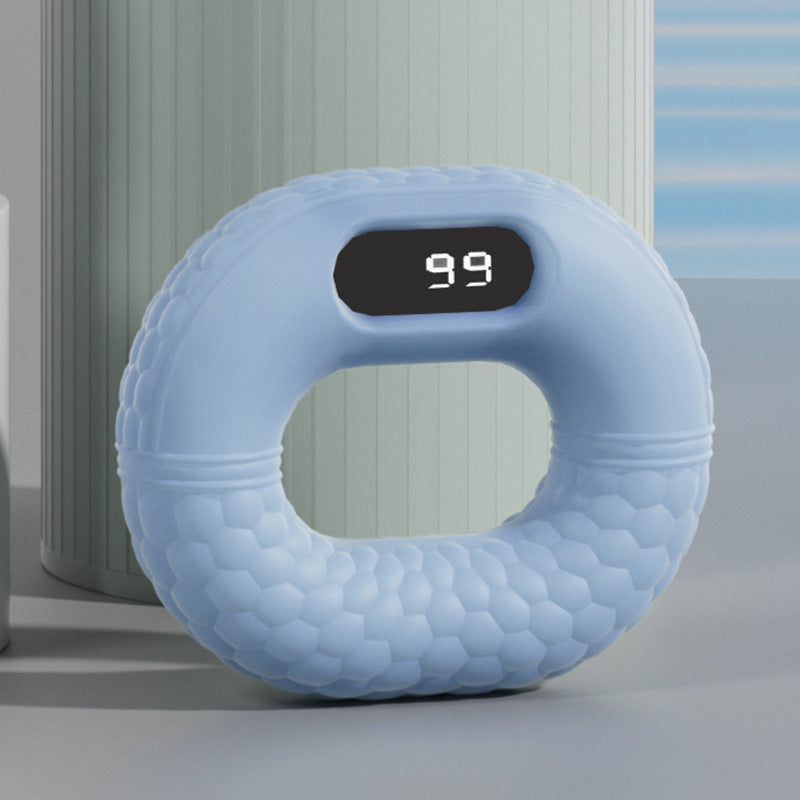 Electronic hand grip strength trainer with built-in counter, designed to track grip exercises and improve hand and forearm strength in 20LB resistance and in Mist Blue color (Color & Resistance: 20LB - Mist Blue)