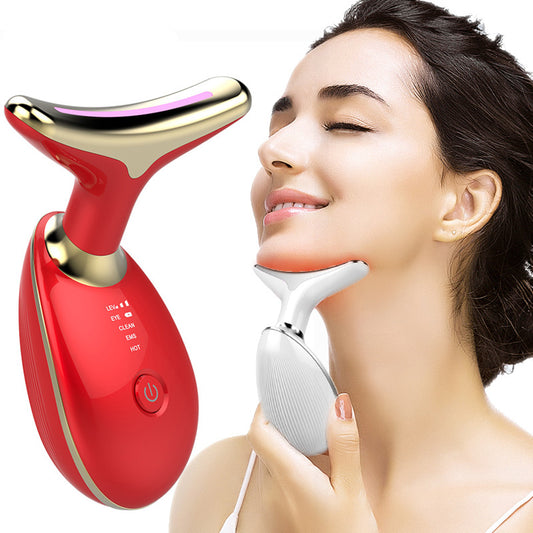 EMS neck and face lifting massager using thermal heat and microcurrent technology during a skincare routine