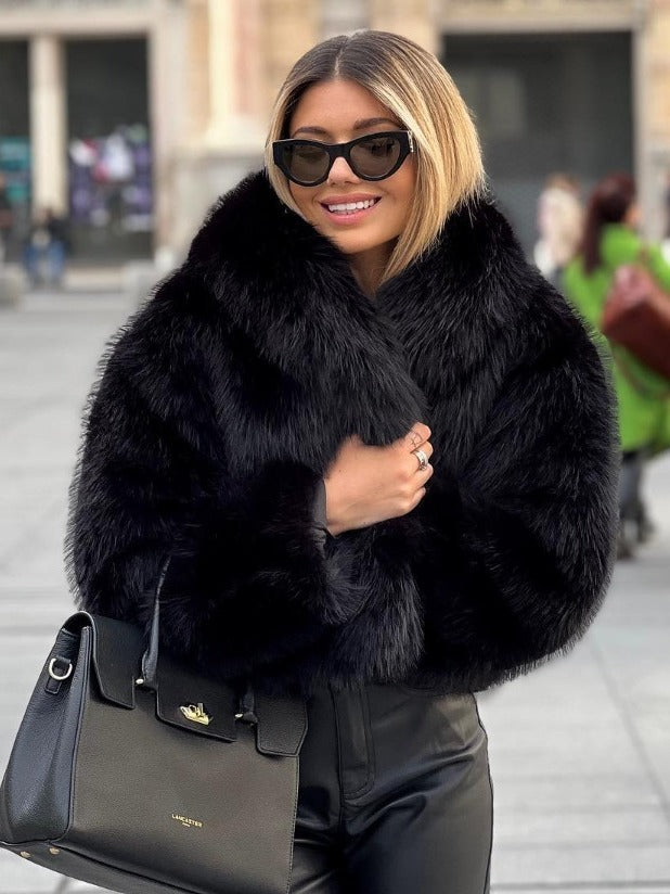 Fluffy plush coat in black color with lapel collar and long sleeves for cozy winter wear model shot