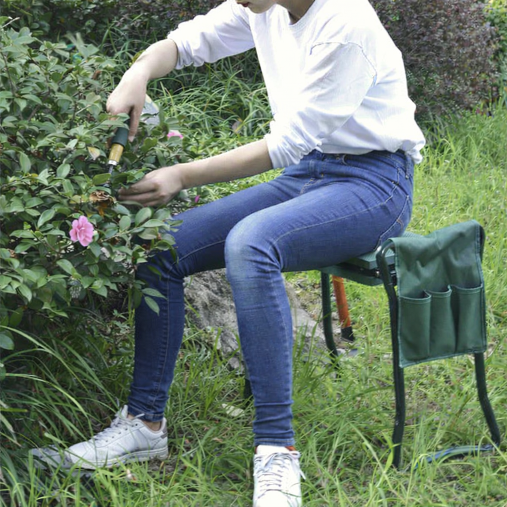 Folding garden kneeler and seat with padded cushion and tool organizer model shot as a chair