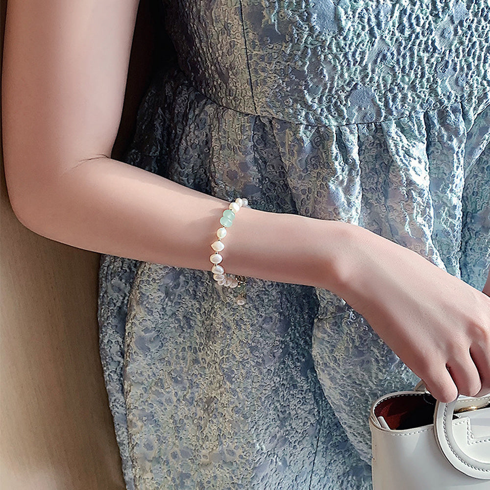 Freshwater pearl adjustable bracelet with elegant minimalist design product shot with model
