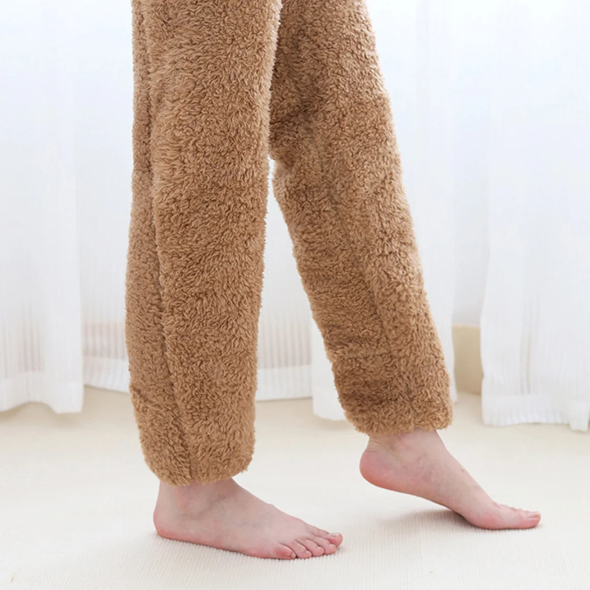 Fuzzy leg warmer socks with soft plush fabric for warmth and comfort in cold weather alternate depiction of open-toe use