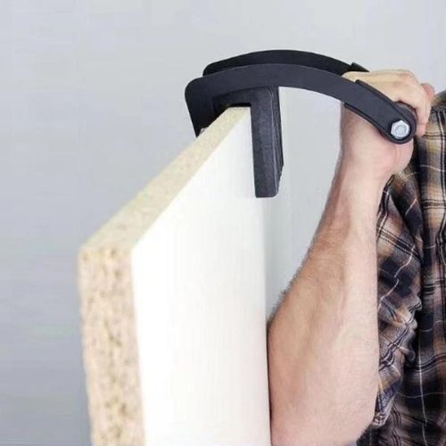 Gorilla gripper carrying tool with ergonomic handle and heavy duty gripping pads for lifting large materials depiction of use