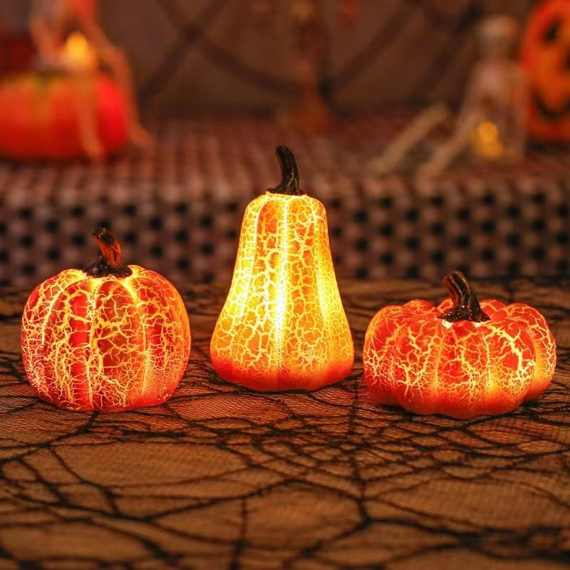 Halloween LED pumpkin light decoration with glowing candle-style illumination for festive home or porch decor trio aligned horizontally