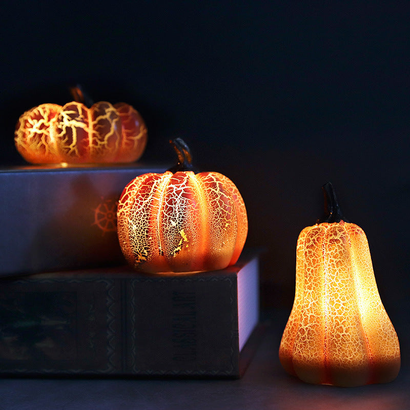 Halloween LED pumpkin light decoration with glowing candle-style illumination for festive home or porch decor trio aligned vertically