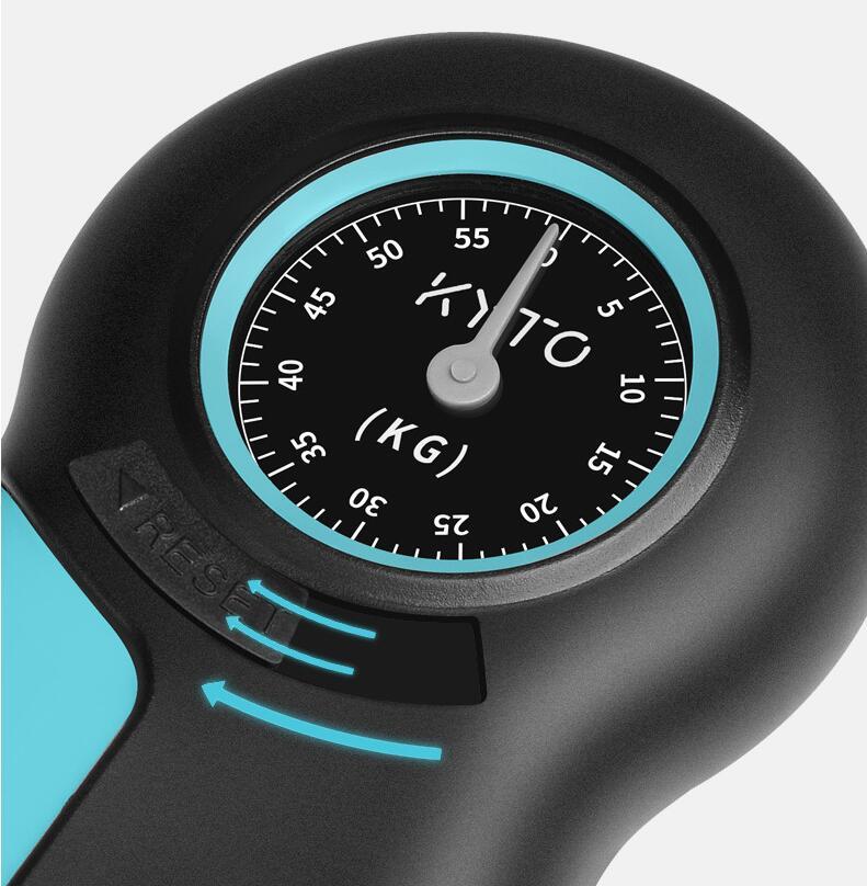 Hand grip strength dynamometer with analog pointer gauge used to measure grip force and hand strength close shot