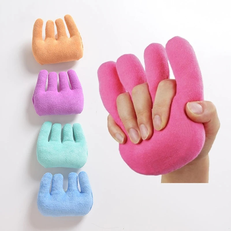 Soft hand rehabilitation grip pad in various colors designed to provide comfortable support during wrist and hand therapy exercises