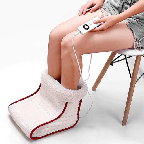Electric heated foot warmer with adjustable temperature settings and soft boot design for winter comfort