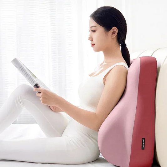 Hip raised bedside sleep cushion made with memory foam for comfortable leg and hip support while resting model shot resting on back