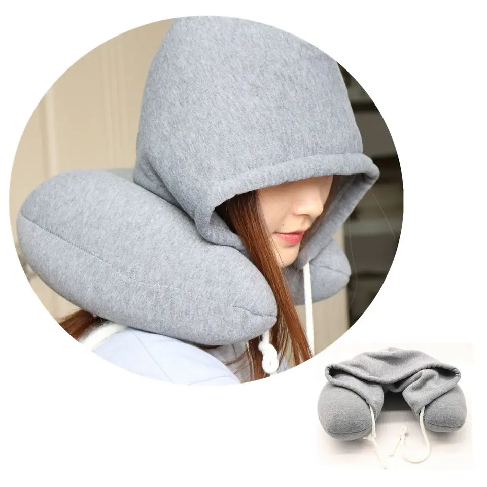 Hooded travel neck pillow with memory foam for comfortable sleep on flights and trips