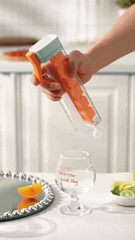 Ice cube tray with handle and press design for easy release of ice cubes gif video