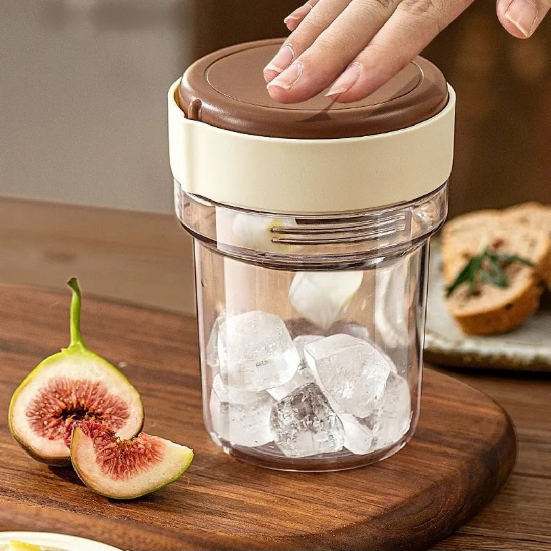 Iced coffee cup with built-in ice tray and leak-proof design for cold brew and iced drinks depiction of pressing from above