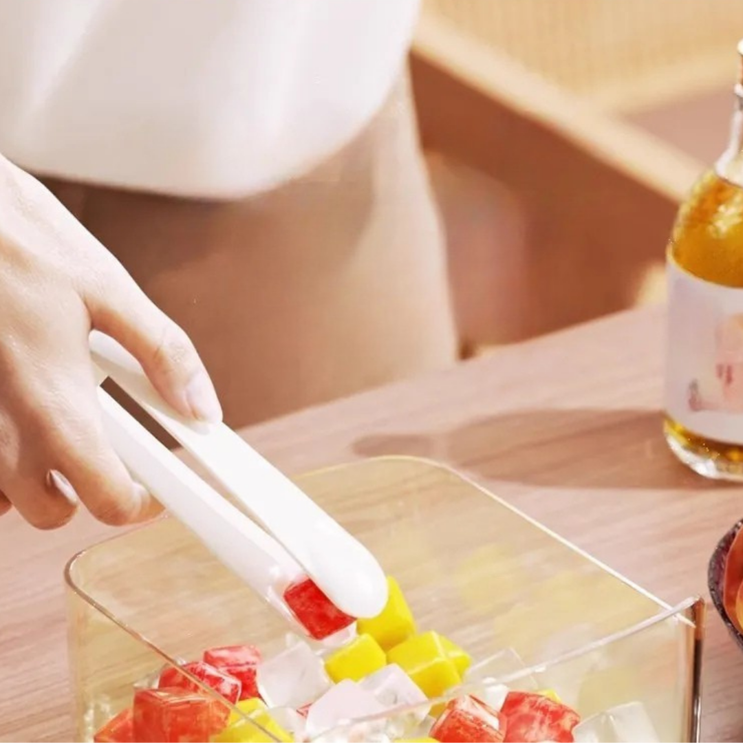 Large capacity ice cube maker tray with press release design for easy ice making and storage depiction of usage of ice clip