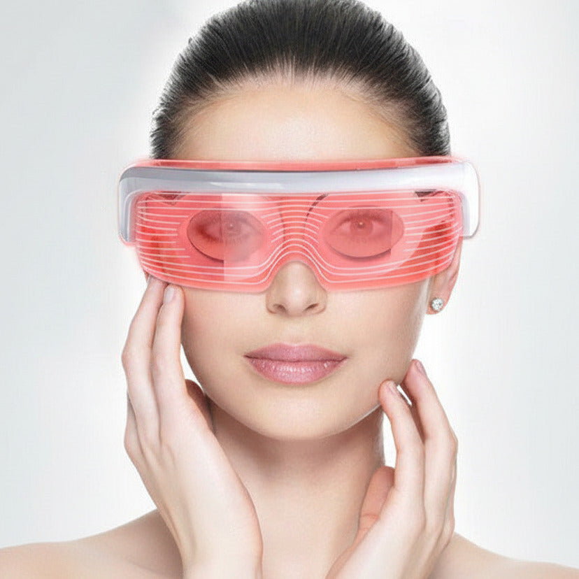 LED light therapy eye massager with heat compress vibration massage and soft silicone design for relaxing eye care model shot