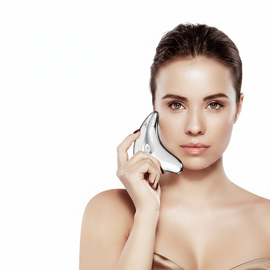 LED microcurrent gua sha massager with ergonomic facial massage design for skincare and relaxation model shot