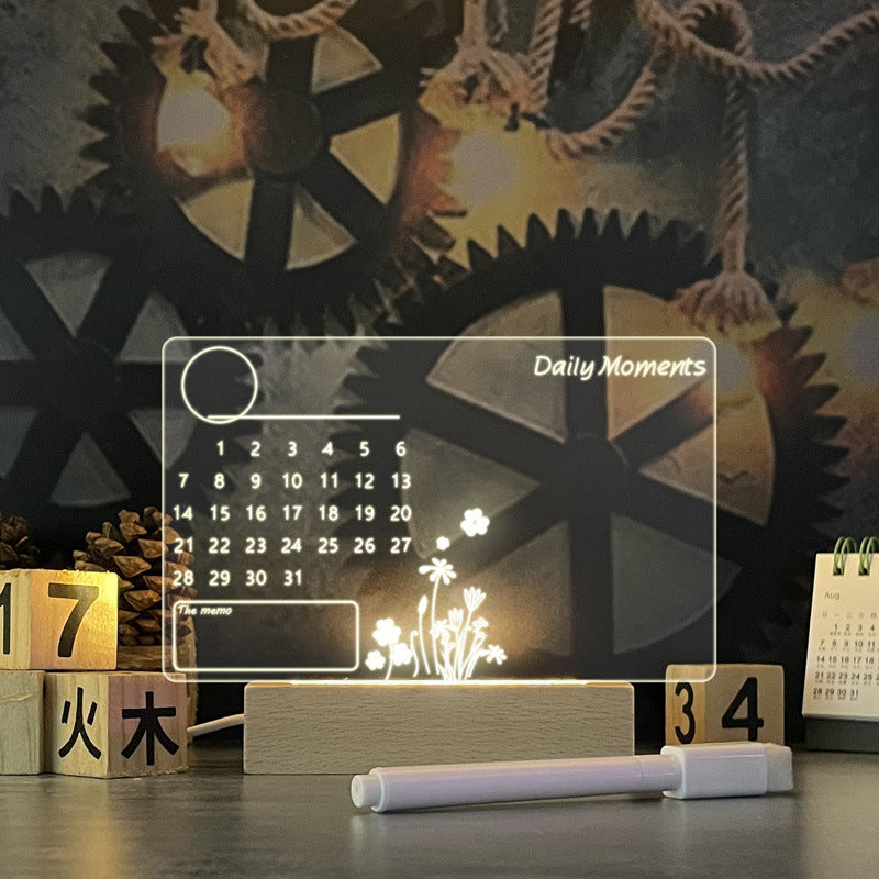 LED note board night light with writable message board and warm LED lighting for notes, reminders, or decorations with a calendar written on it