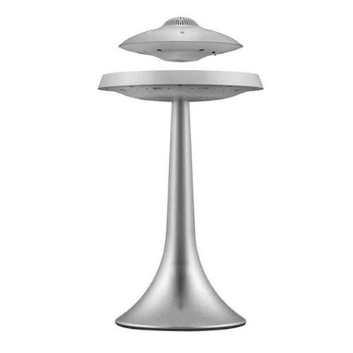 Levitating ufo speaker and lamp with bluetooth audio ambient lighting and futuristic floating design product shot